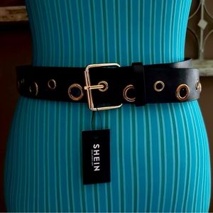 Black buckle belt with gold detail